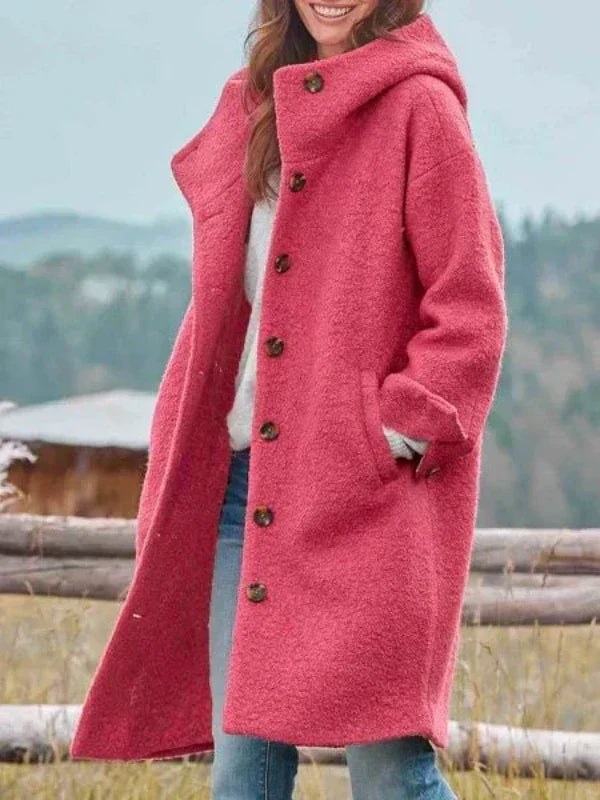 Giacca invernale lunga da donna slim fit, elegante e calda, con pratiche tasche per un outfit sofisticato.