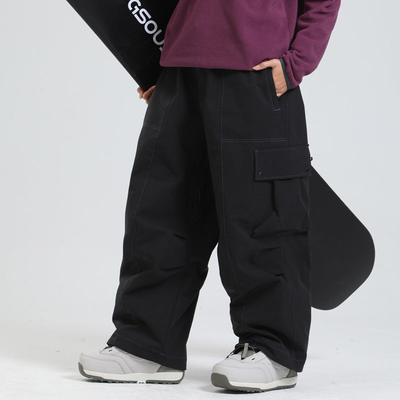 Versatili pantaloni invernali unisex per sci e snowboard, con vestibilità ampia e protezione dagli elementi.