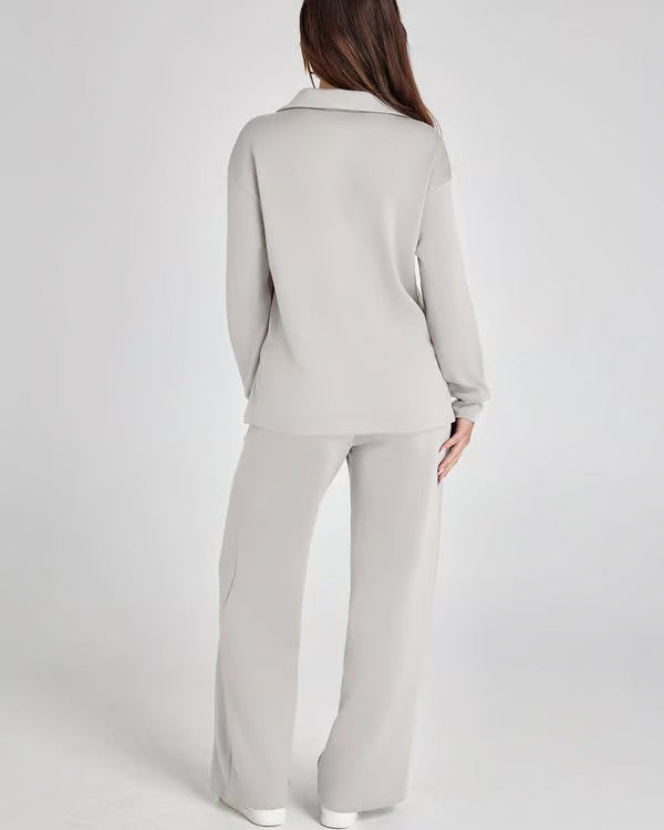 Completo moda donna all-season: felpa V-neck e pantaloni ampi, per stile e massimo comfort.