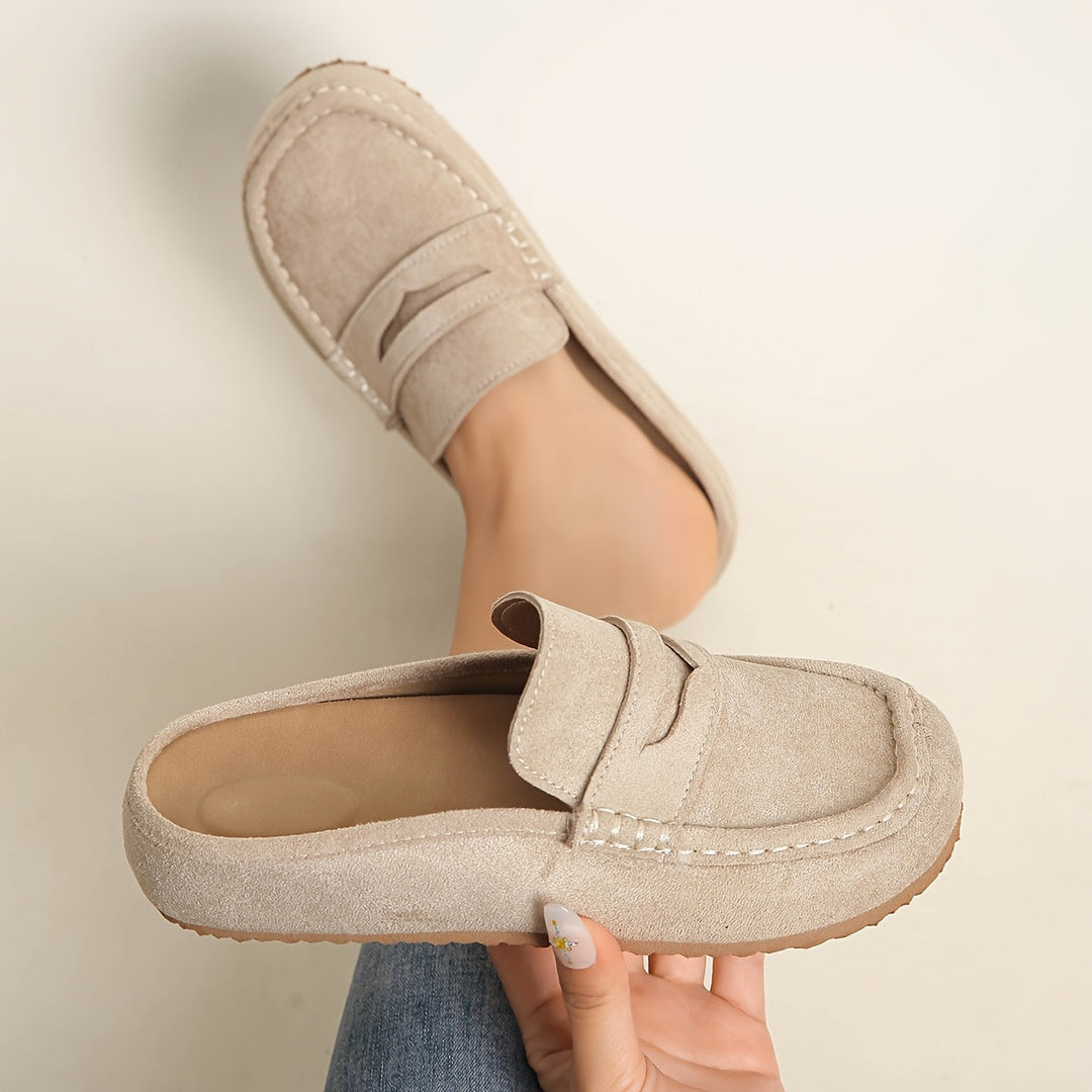 Sabot slip-on da donna con plateau, stile casual-elegante in tessuto traspirante.
