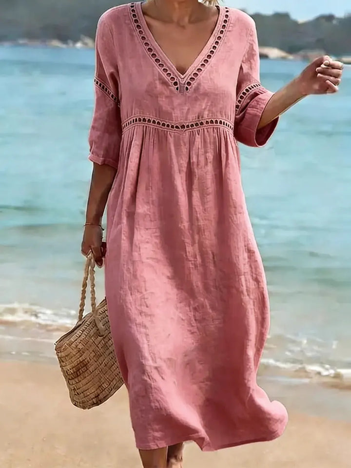 Elegante abito estivo midi da donna in cotone con scollo a V, perfetto per look casual chic.