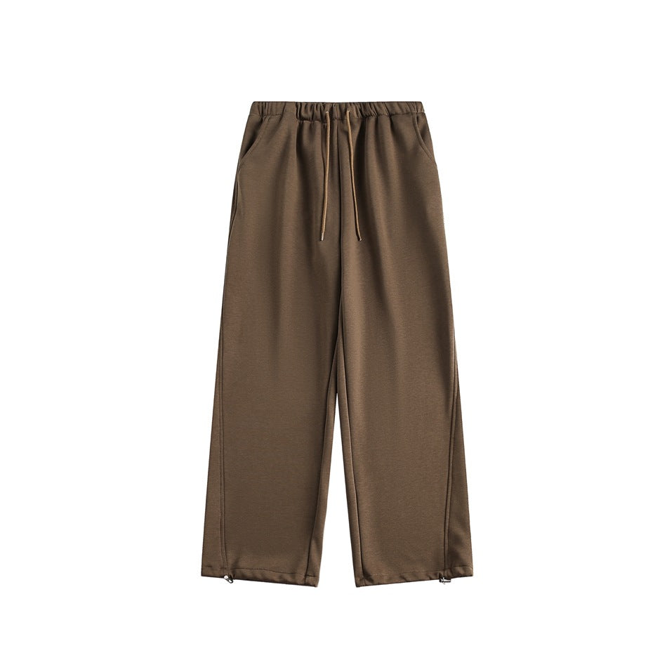 Pantaloni tuta donna athleisure con vita regolabile. Stile moderno e confortevole per ogni occasione.