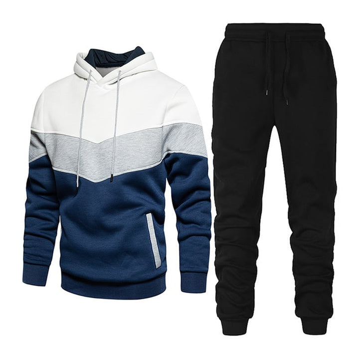 Elegante tuta uomo casual patchwork con cappuccio, design moderno per ogni stagione. Set due pezzi comodo per streetwear.