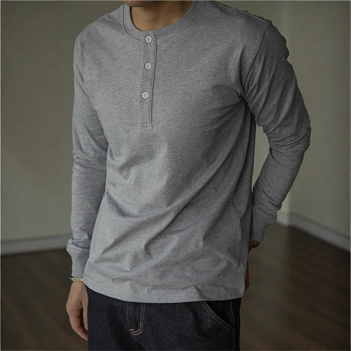Camicia Henley da uomo a maniche lunghe in cotone, ottima per outfit versatile e moda uomo.