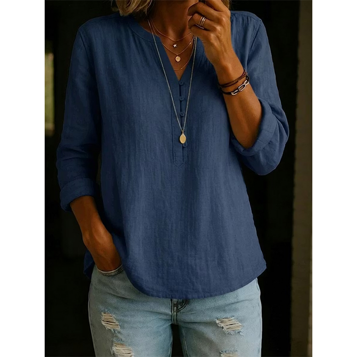 Camicia donna ampia collo a V con bottoni. Stile casual-elegante per primavera/autunno.