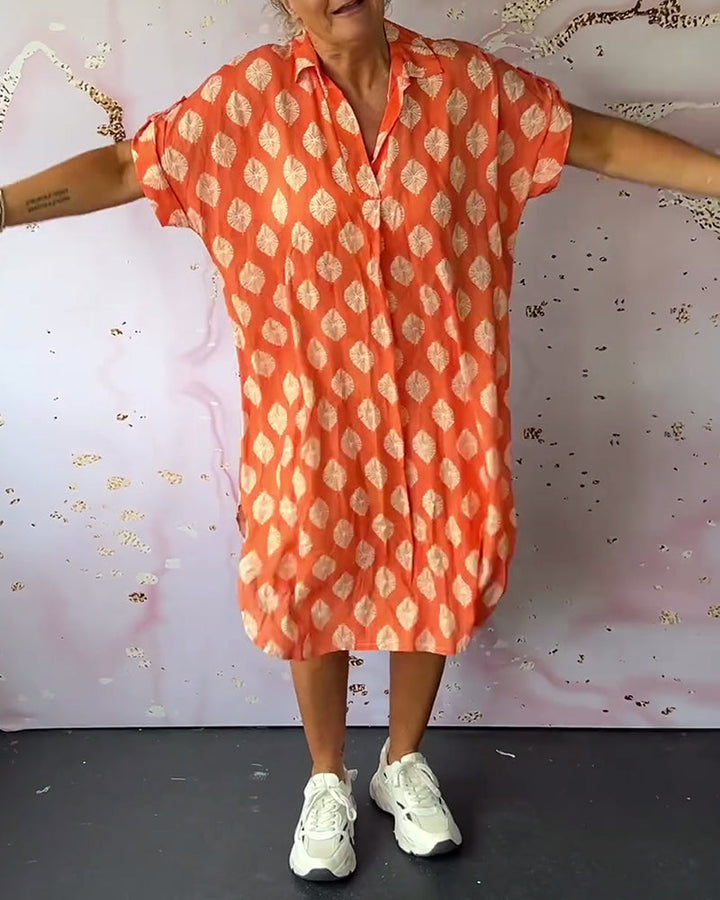 Elegante abito midi estivo donna con scollo a V, leggero e versatile. Anche in taglie forti, abbigliamento moda.