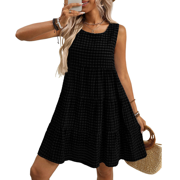 Abito midi donna versatile, motivo a quadri bianco e nero, senza maniche. Elegante e casual, per ogni outfit estivo.