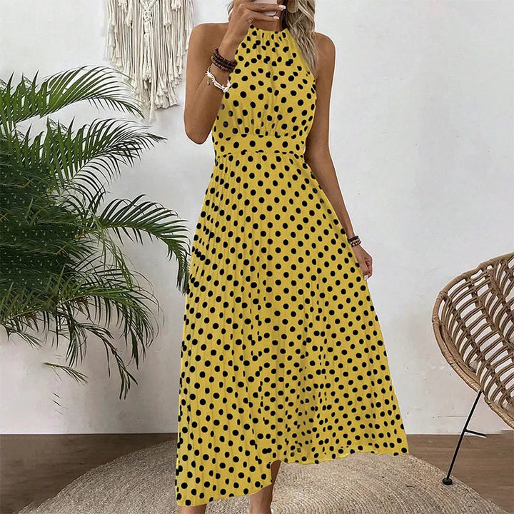 Abito da donna maxi a pois, collo halter, stile elegante e confortevole in poliestere.