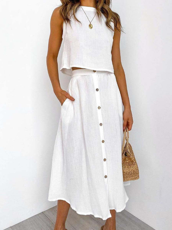 Gilet casual donna e abito midi stampato. Completo due pezzi ideale per un outfit primaverile.