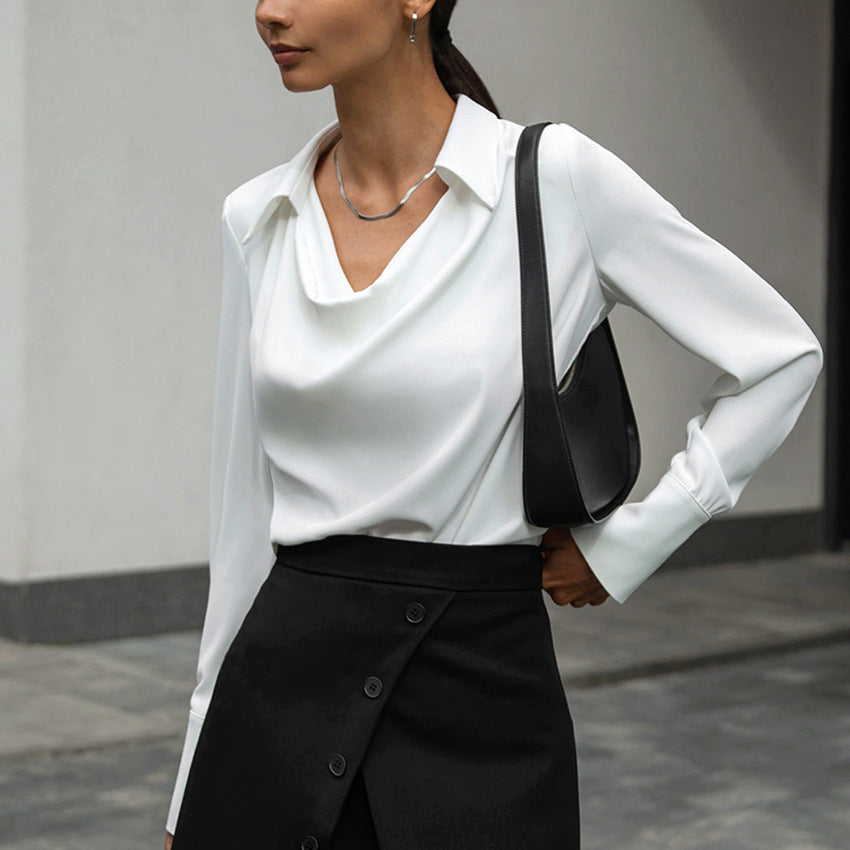 Modella indossa camicia lunga donna, collo drappeggiato, manica lunga, stile elegante e versatile, tinta unita.
