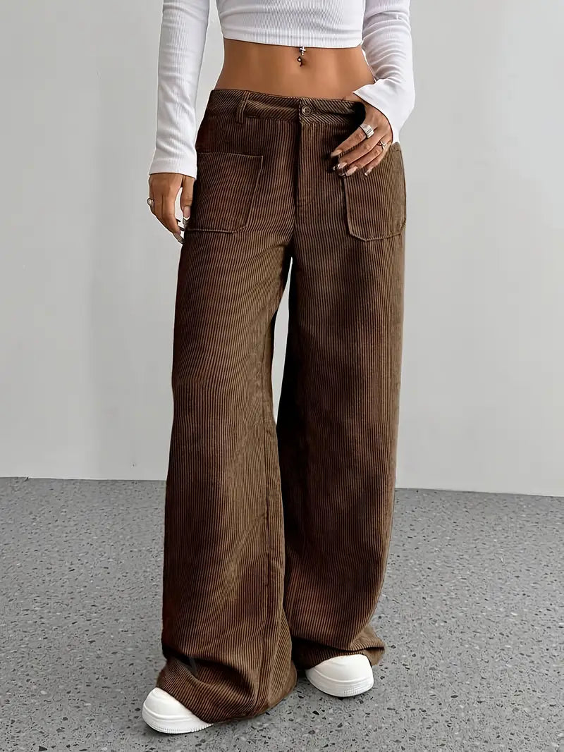 Pantaloni comodi da donna, a coste, con vita alta e gamba larga. Essenziali per il guardaroba.