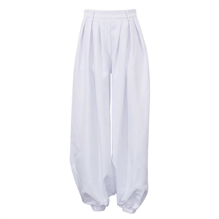 Versatili pantaloni donna bianchi a vita alta, gamba ampia, perfetti per look estivi casual o eleganti.