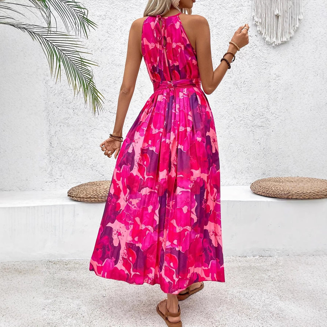 Elegante abito midi floreale per donna, con taglio senza maniche e vita plissettata, un must-have della moda estiva.