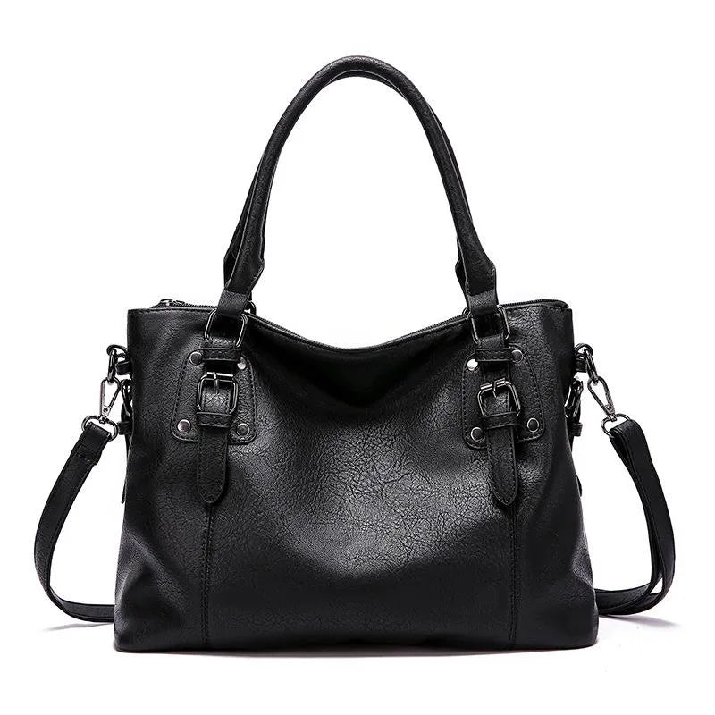 Borsa nera in vera pelle da donna, design versatile e chic, perfetta per organizzazione e stile quotidiano.