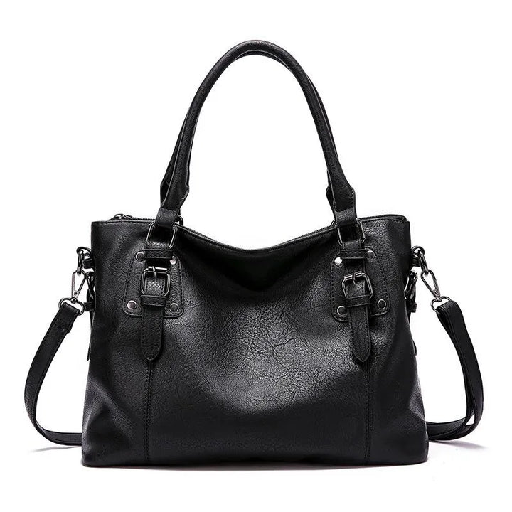 Borsa nera in vera pelle da donna, design versatile e chic, perfetta per organizzazione e stile quotidiano.