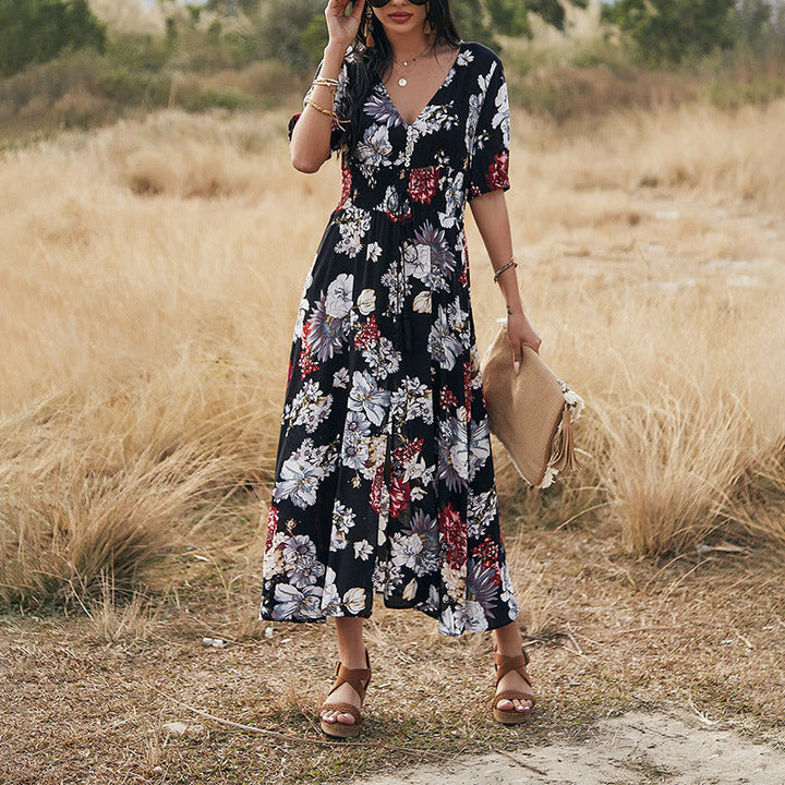 Abito midi estivo floreale da donna con scollo a V e gonna ampia. Elegante e leggero per l'estate.