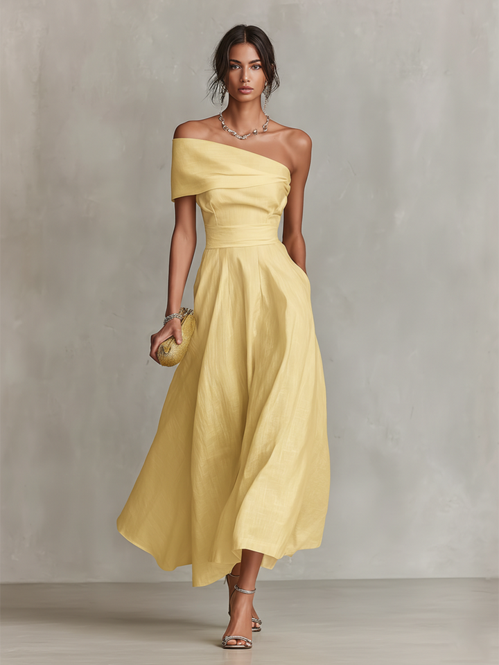 Abito monospalla da donna in lino color giallo sole, perfetto per un look casual chic estivo e serate eleganti.