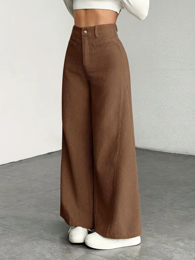 Pantaloni donna a vita alta, gamba larga versatile. Ideali per outfit casual o eleganti, massimizzano comfort e stile.