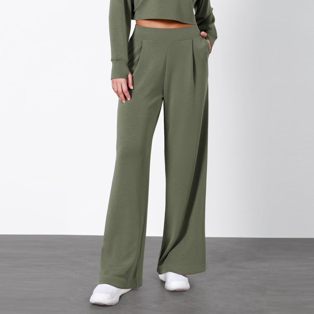 Pantaloni moda donna: vita alta, gamba dritta e design drappeggiato. Per un look moderno e raffinato.