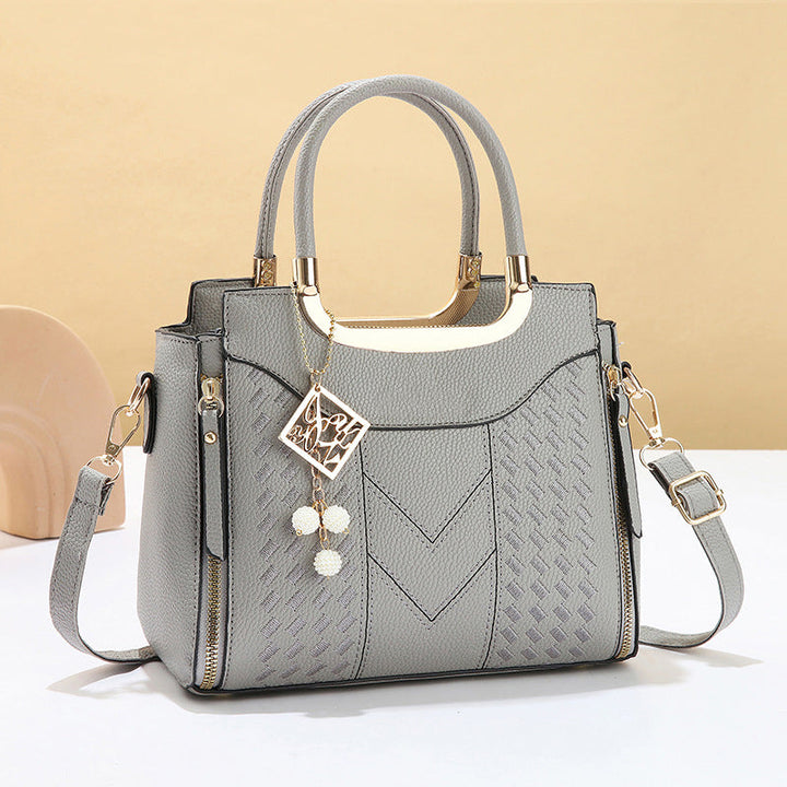 Borsa donna in pelle PU trapuntata con tracolla, stile elegante e versatile per ogni occasione.