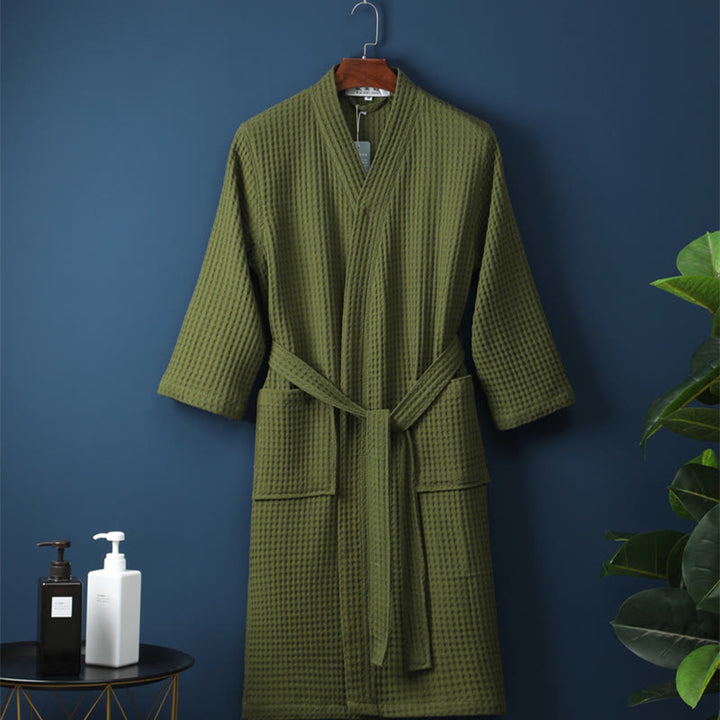 Accappatoio unisex comodo e versatile in cotone a coste, per casa e relax quotidiano.