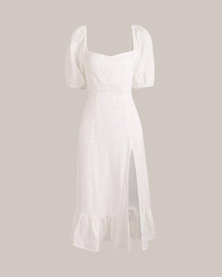 Abito midi chic da donna, scollo quadrato e maniche a sbuffo. Ideale per un outfit di giornata elegante e comodo.