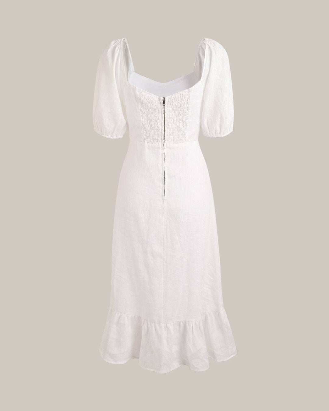 Elegante abito midi da donna con scollo quadrato e maniche sbuffo, perfetto per un look sofisticato e alla moda.
