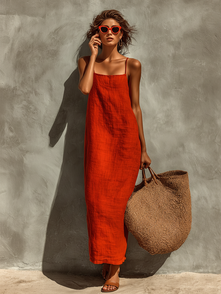 Elegante abito casual da donna in lino rosso con spalline sottili per look estivi e da vacanza.