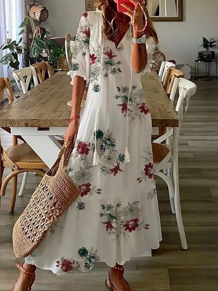 Abito maxi bohémien da donna, leggero e fluido, un capo estivo essenziale per vacanze e outfit casual.