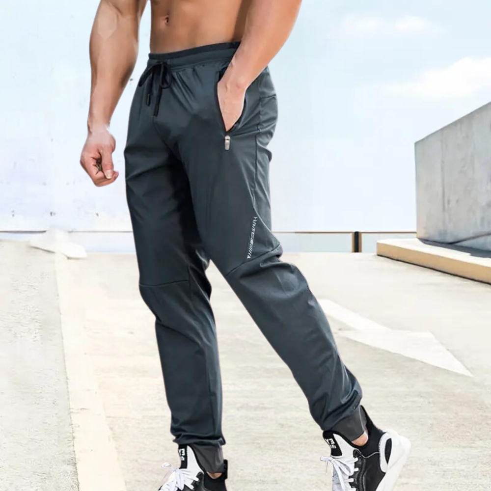 Pantaloni uomo leggeri per attività outdoor, tessuto traspirante per corsa e allenamento, massimo comfort.