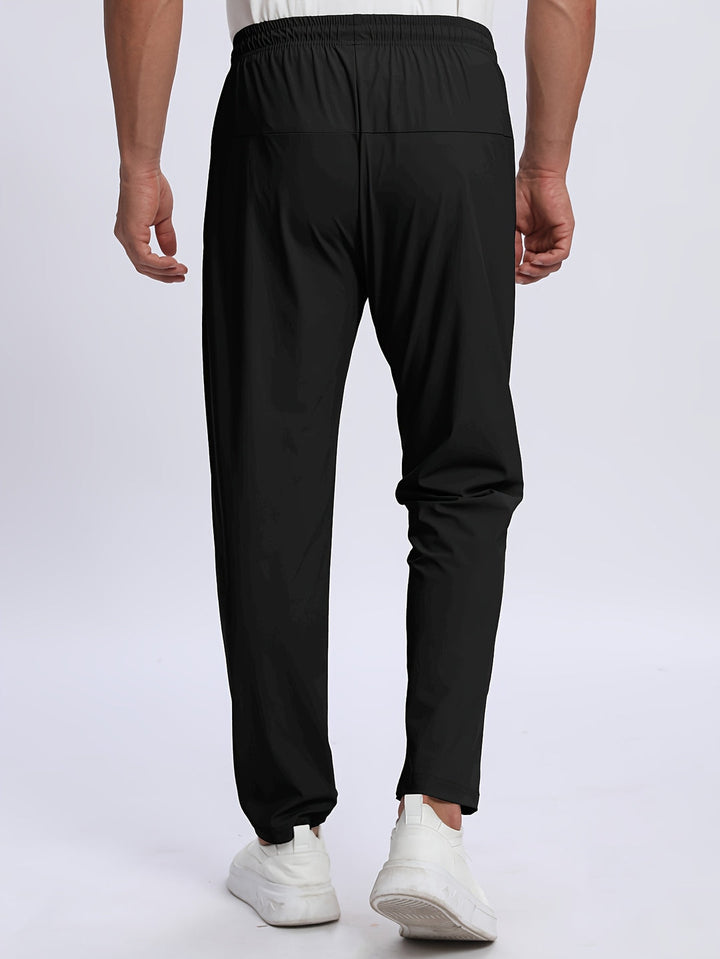 Pantaloni sportivi uomo con zip, stile moderno per abbigliamento athleisure e comfort urbano.
