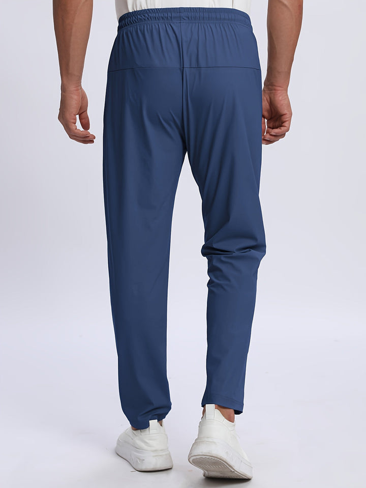 Pantaloni casual uomo versatili grigi, comodi per lo sport e l'abbigliamento di tutti i giorni.