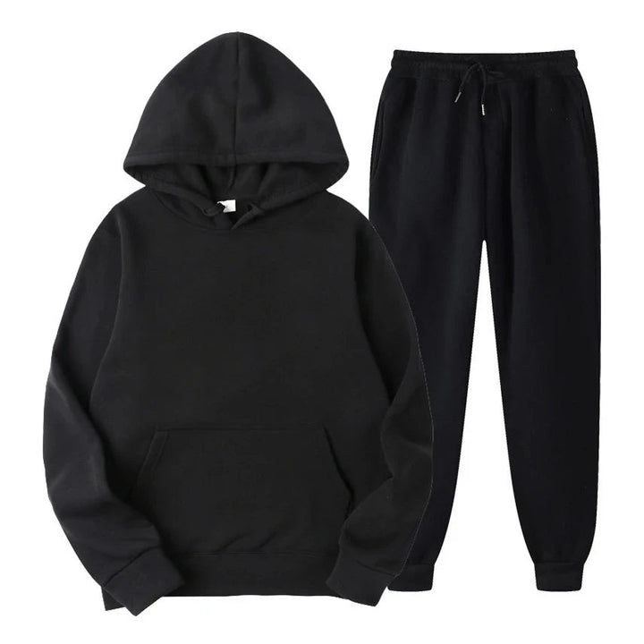 Completo sportivo uomo elegante in grigio melange, ideale per jogging, palestra o outfit casual.