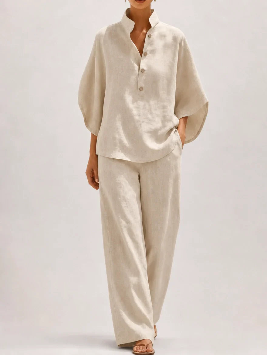 Camicia donna con maniche a palloncino e pantaloni palazzo. Set elegante e versatile per outfit estivi.
