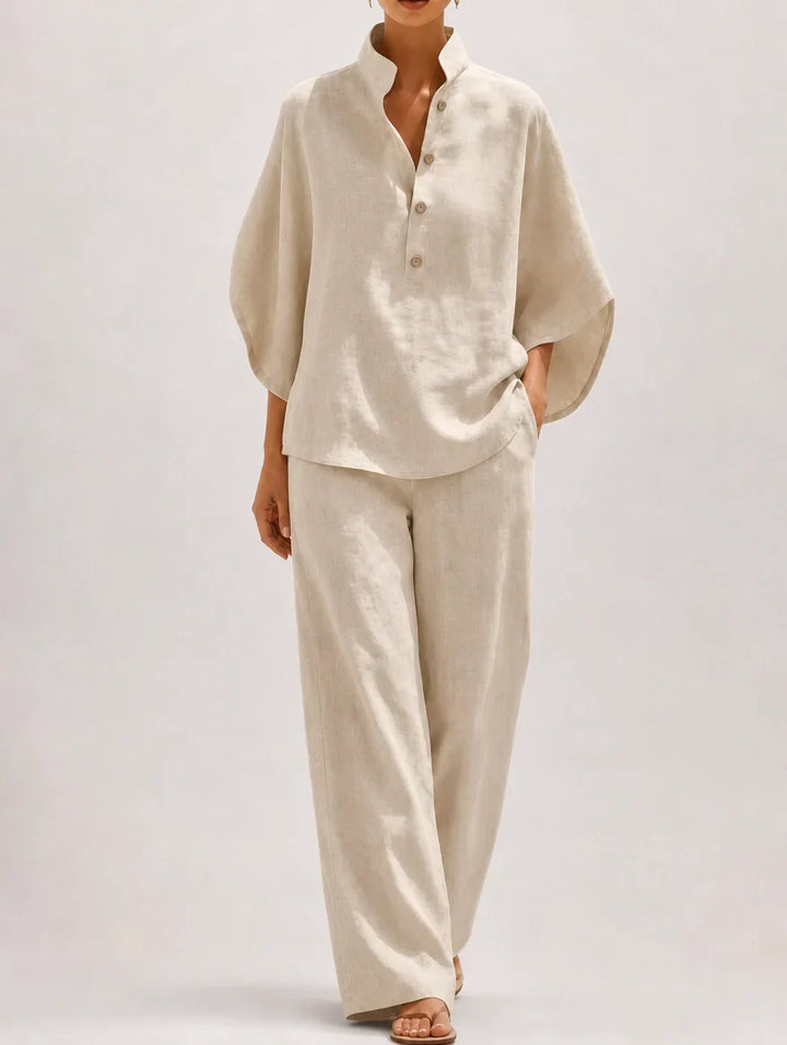 Camicia donna con maniche a palloncino e pantaloni palazzo. Set elegante e versatile per outfit estivi.