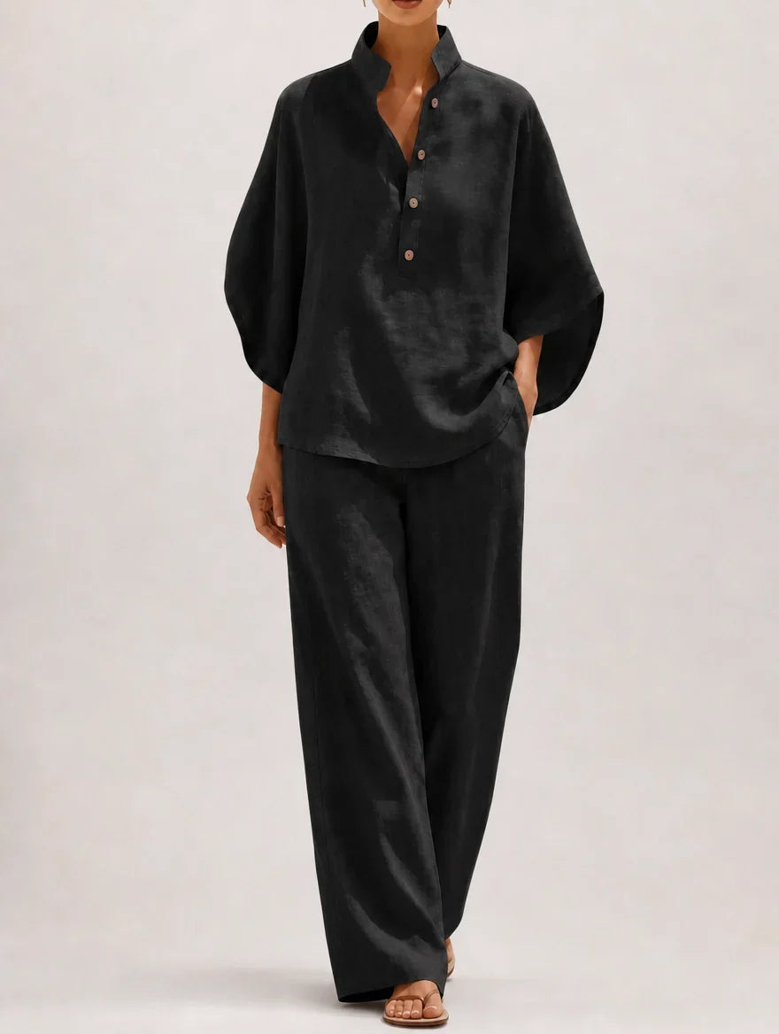 Pantaloni palazzo e camicia coordinata donna. Set elegante per abbigliamento femminile, perfetto per ufficio.