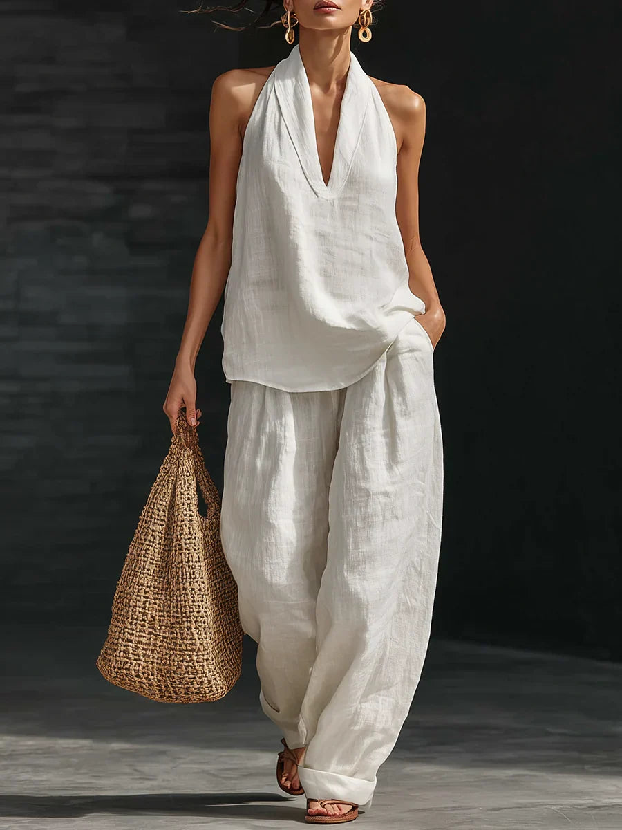 Set coordinato donna estivo: top scollo a V e pantaloni a gamba larga, look casual/elegante versatile.