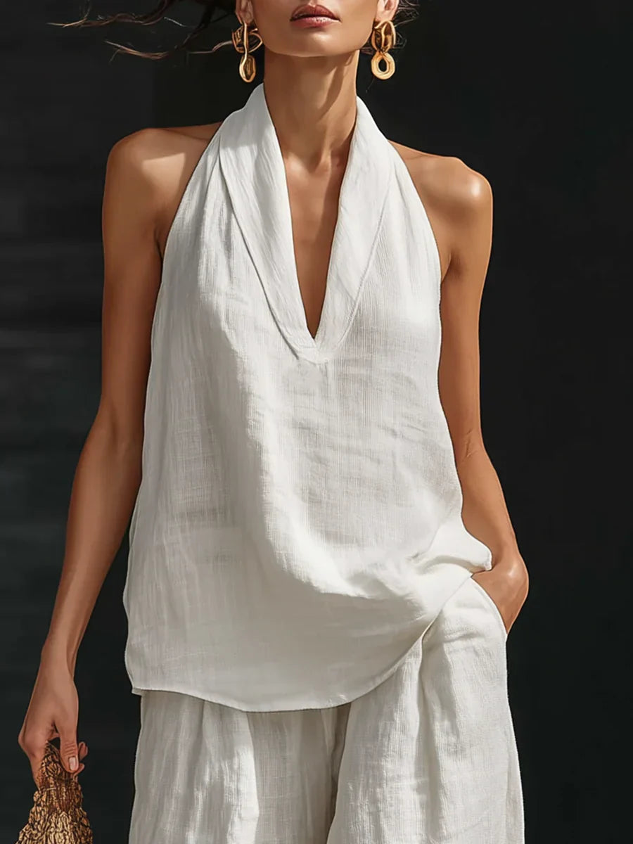 Set coordinato donna, outfit casual ed elegante. Top con scollo a V, pantaloni ampi per comfort estivo.
