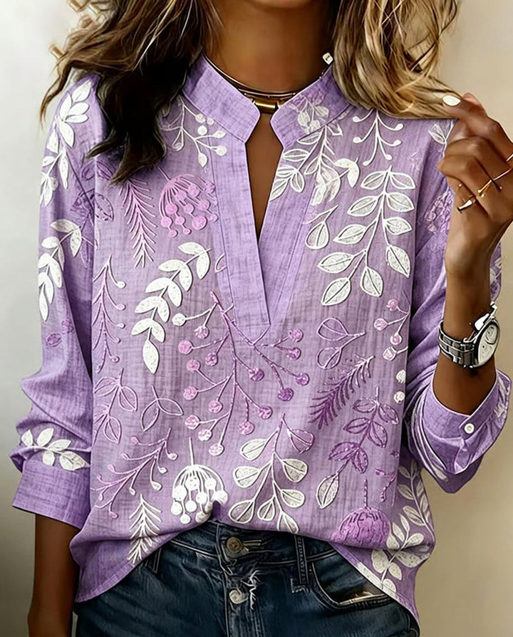 Blusa floreale da donna con scollo a V e maniche tre quarti, ideale per primavera/estate. Stile casual ed elegante.