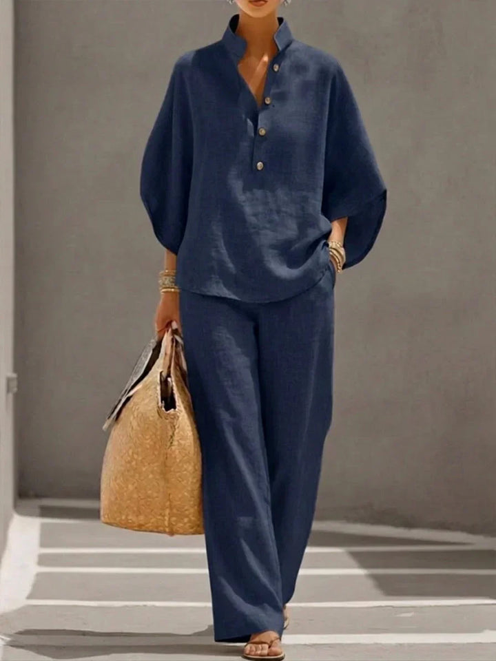 Completo donna elegante camicia maniche pipistrello e pantaloni larghi. Set due pezzi coordinato per primavera/estate.