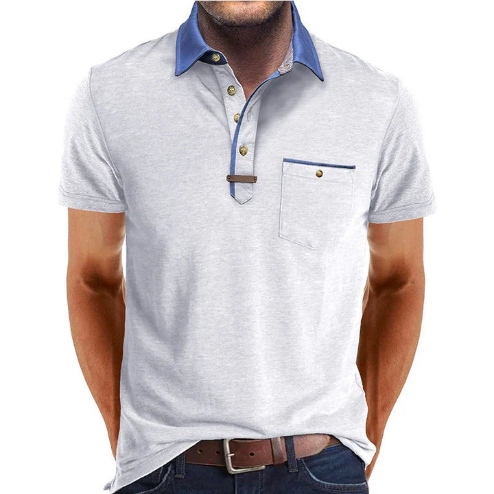 Moda femminile: polo da donna con colletto distinto e taschino, un capo essenziale per il guardaroba.