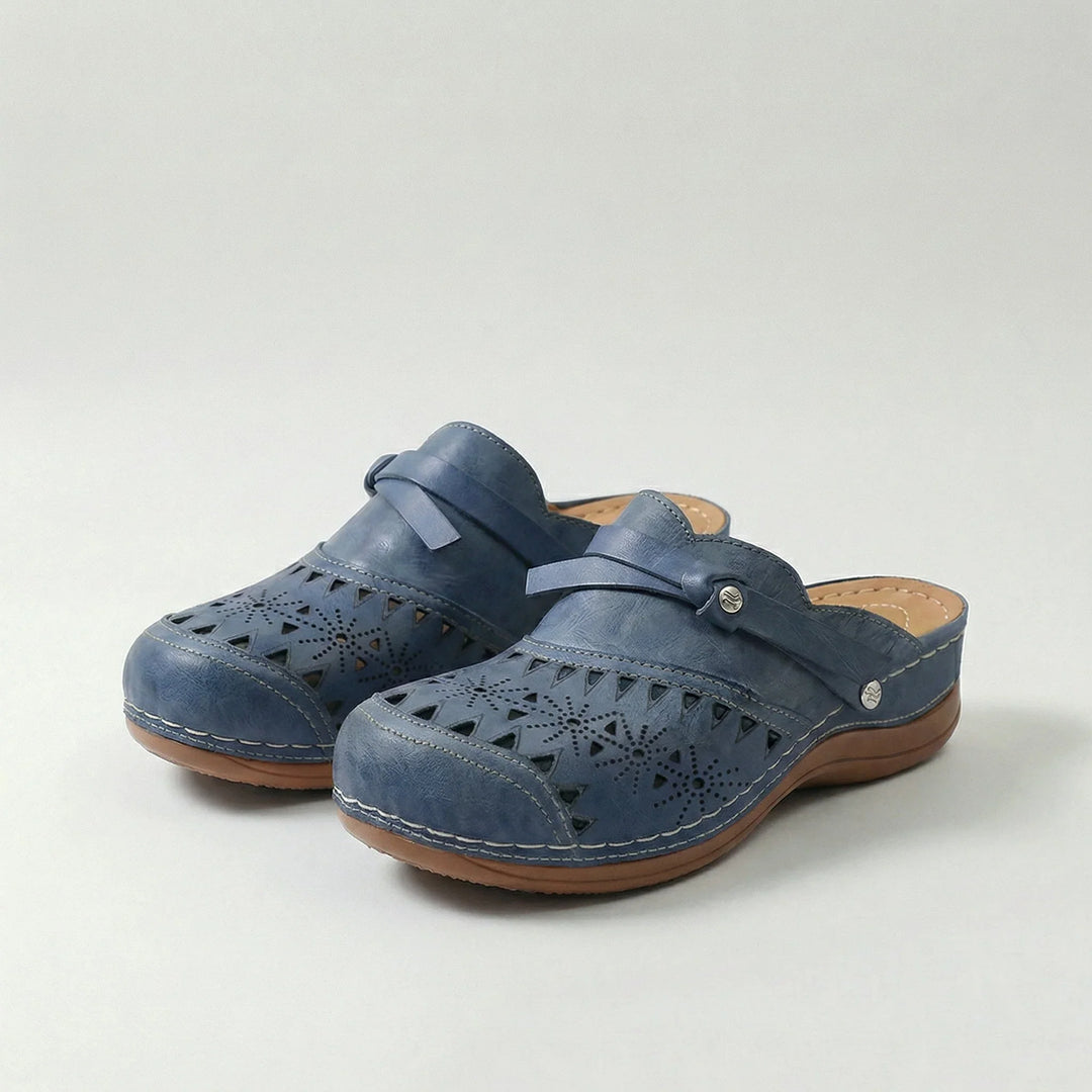 Zoccoli donna traforati con fiocco, mules comode ed eleganti per l'estate, stile casual e ammortizzato.
