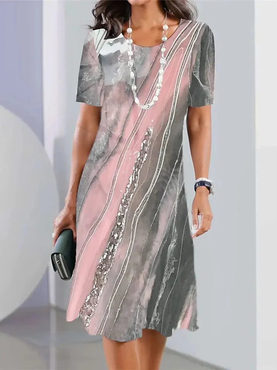 Elegante abito midi da donna con stampa astratta, girocollo e taglio ad A per un look sofisticato.