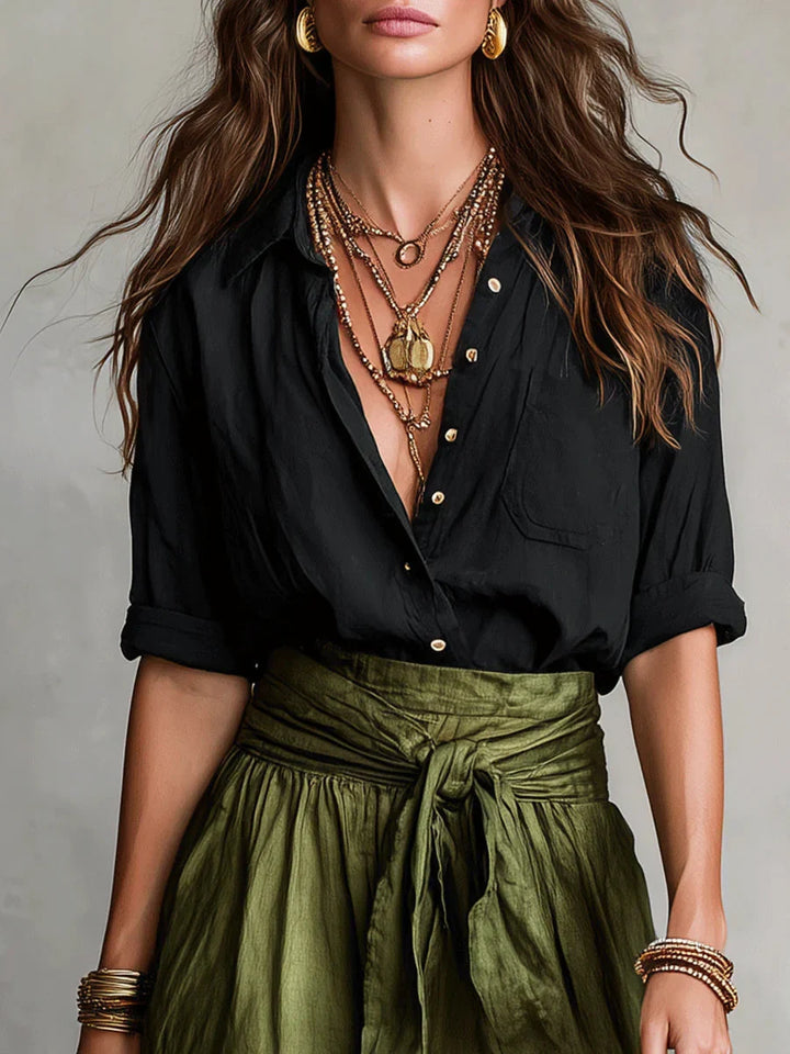 Gonna lunga da donna con cintura e zip laterale, a vita alta. Vestibilità fluida, ideale per moda donna.
