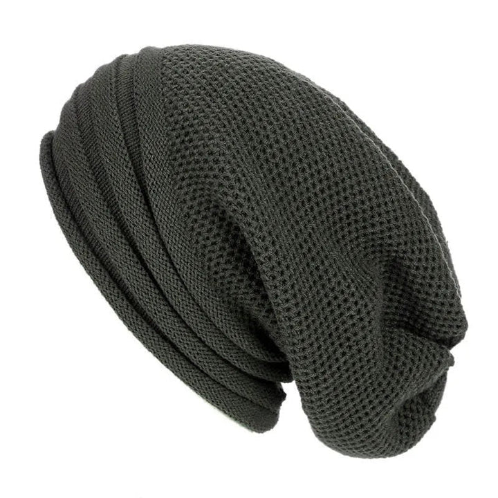 Copricapo ragazza nero: cappello beanie slouchy con distintiva trama a nido d'ape, caldo e di tendenza.