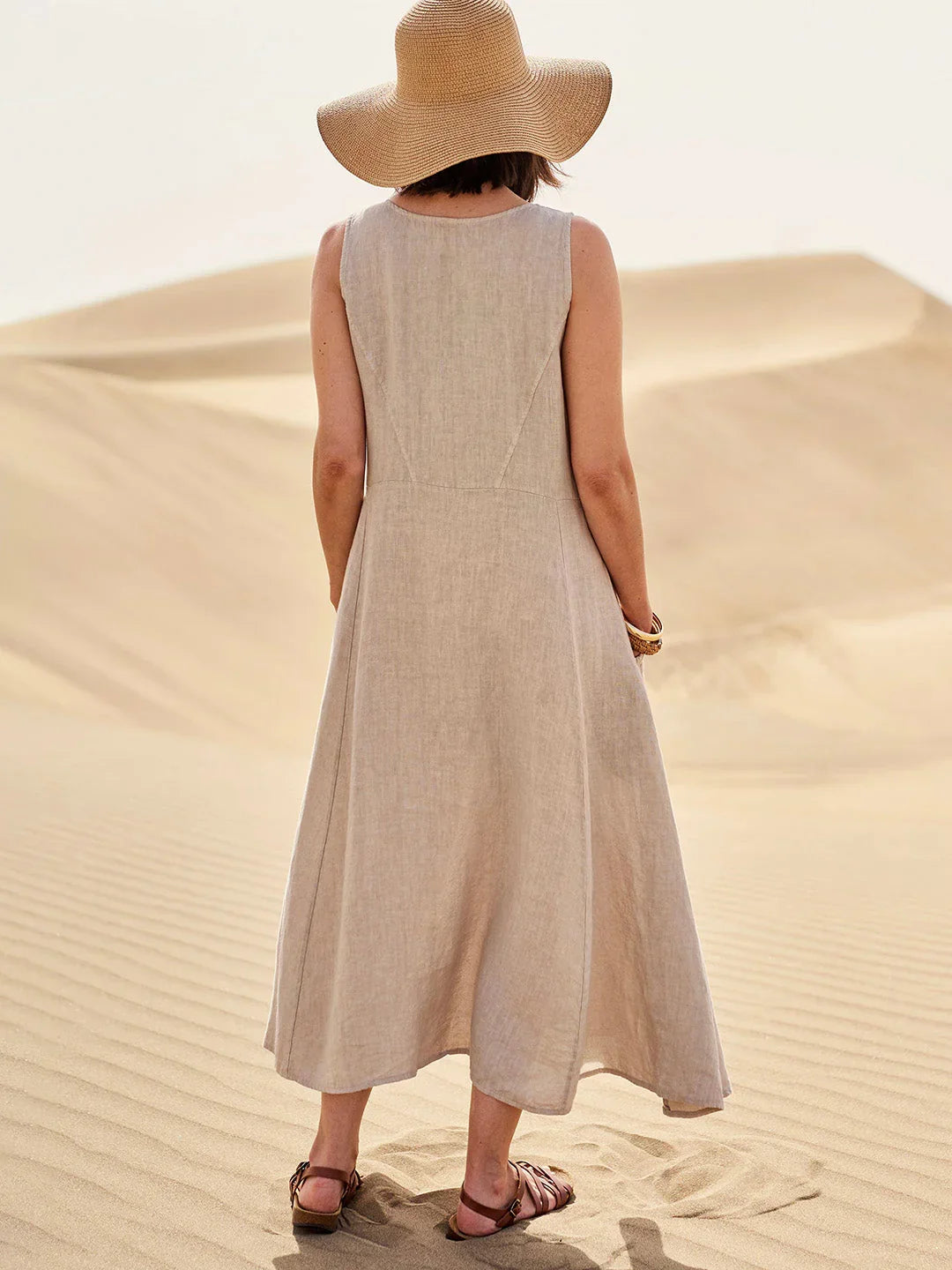 Abito maxi estivo casual da donna con comode tasche e scollo rotondo.
