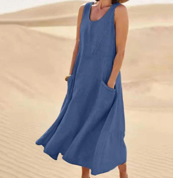Elegante vestito lungo donna con scollo tondo, ideale per la stagione primaverile.