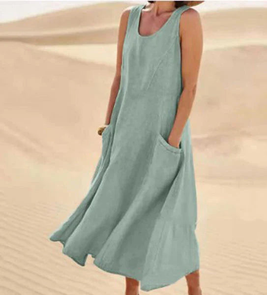 Maxi vestito donna versatile, con tasche e scollo rotondo, perfetto stile casual.