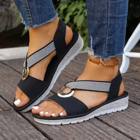 Calzature estive donna: sandali ortopedici con cinturino intrecciato per comfort e stile.