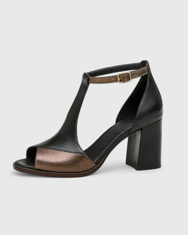 Sandali estivi da donna con comodo tacco grosso e cinturino a T regolabile, ideali per un look elegante e confortevole.